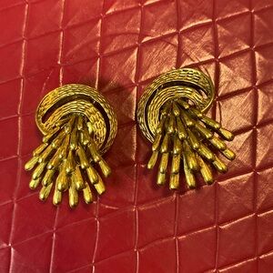Oscar de la Renta clip on earrings.